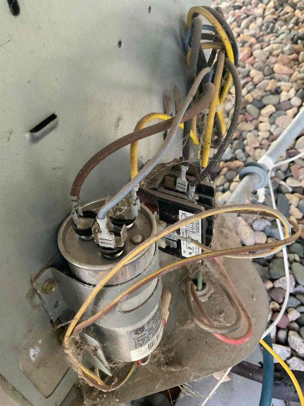 # HVAC Service Completion

Responded to no cooling complaint on 17-year-old residential air conditioning system. Upon arrival, performed diagnostic evaluation and confirmed system was low on refrigerant. System had previously required 2 pounds of refrigerant the prior year, indicating ongoing leak or system deterioration. Given the age of the equipment (17 years old), history of refrigerant loss, and declining reliability, recommended full system replacement rather than additional repairs. Customer approved replacement of aging unit. Removed existing outdoor condenser unit and associated components. Installed new air conditioning system on existing concrete pad. Connected refrigerant lines, electrical wiring, and condensate drain. Verified proper electrical connections at disconnect box and capacitor assembly. Tested new system operation and confirmed proper cooling function. Left work area clean with equipment operational.