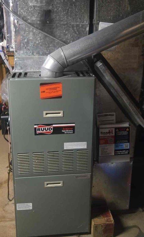 Responded to no cooling complaint on recently installed RUUD system with non-operational blower motor. Upon inspection, discovered loose wiring connections to blower motor inside junction box. Secured and tightened all electrical connections at blower motor wiring box, restored proper contact, and cycled system through complete operational test to verify airflow and cooling function restored to normal parameters.