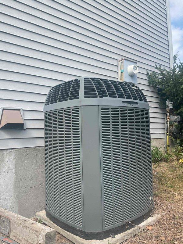 Responded to no cooling complaint on 13+ year old system experiencing short cycling and rising indoor temperatures. Upon inspection, found unit low on refrigerant. Due to age of equipment and extent of refrigerant loss, provided customer with options to either replace system or recharge with refrigerant and add leak detection dye for monitoring. Customer elected preferred service option and system was restored to proper operation with cooling function confirmed before departure.