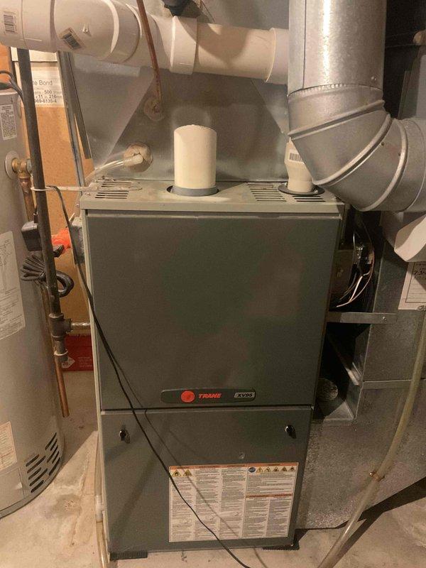 Responded to no cooling complaint on 13+ year old system experiencing short cycling and rising indoor temperatures. Upon inspection, found unit low on refrigerant. Due to age of equipment and extent of refrigerant loss, provided customer with options to either replace system or recharge with refrigerant and add leak detection dye for monitoring. Customer elected preferred service option and system was restored to proper operation with cooling function confirmed before departure.