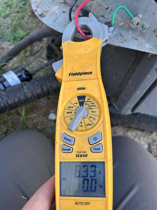 Responded to callback for 4-year-old residential AC system with no cooling and intermittent loud screeching noise. Upon arrival, discovered system would not power on due to burned wire at condenser unit. Repaired damaged electrical connection and restored power to unit. Conducted operational testing and monitored system performance while investigating previously reported squealing noise that occurs during shutdown and idle periods. Observed system experiencing pressure equalization issues when compressor cycles off, indicating potential thermostatic expansion valve malfunction. Verified amperage draw at 6.33A during operation. System currently operational but requires TXV replacement to resolve pressure equalization concern and eliminate screeching noise during shutdown cycles.