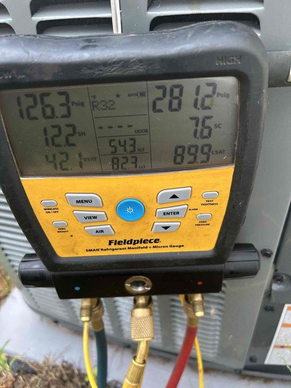 Responded to no cooling complaint on recently installed residential air conditioning system. Upon inspection, discovered blower speed was left on factory default maximum setting, which was causing inadequate dehumidification and poor cooling performance during humid conditions. Adjusted blower speed from maximum to medium setting to optimize airflow and system efficiency. Verified refrigerant pressures and system operating parameters using digital manifold gauges, confirming proper charge and temperatures. Monitored system operation after adjustment to ensure proper cooling cycle and adequate temperature differential. Unit now operating within manufacturer specifications with improved comfort and humidity control.