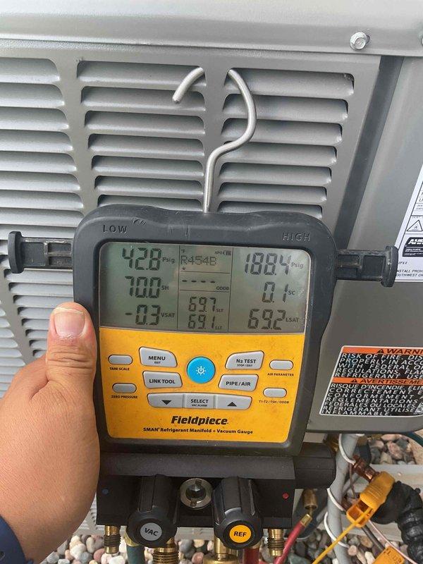 Responded to no cool condition on recently installed Lennox system that was short cycling and unable to maintain thermostat setpoint. Upon diagnostic evaluation using manifold gauges, determined system was low on refrigerant. Added refrigerant to manufacturer specifications and injected UV dye into system for future leak detection. Verified proper pressures and system operation upon completion.