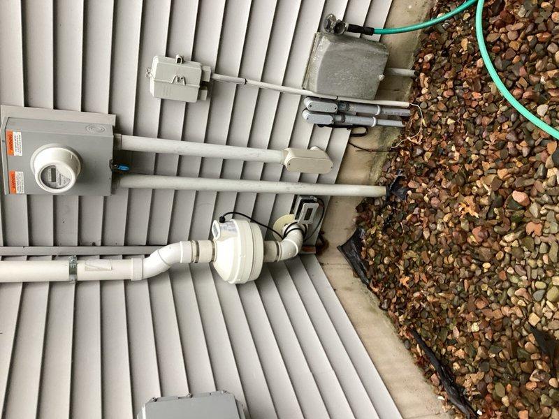 Completed recurring plumbing and HVAC inspection for multi-family property. Evaluated bathroom plumbing fixtures including chrome-plated tub diverter valve and shower components, noting overall good condition with minor wear on chrome finish. Inspected outdoor air conditioning unit, electrical disconnect, refrigerant lines, and PVC condensate drain system with P-trap configuration. Documented findings with photographs and provided written notes and estimates for any recommended repairs or maintenance items identified during inspection.