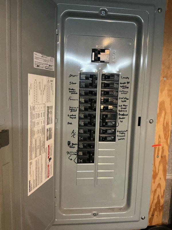 Responded to no-cooling complaint on 11-year-old AC system with loud buzzing and intermittent high-pitched whistling sounds. Diagnosed system as critically low on refrigerant, causing indoor evaporator coil to freeze and restrict airflow, which produced the reported whistling noise. Confirmed no damage to furnace from ice melt at time of inspection. Identified refrigerant leak present in system requiring leak search and repair. Presented repair options to customer and scheduled same-day estimate for complete AC replacement due to age and condition of existing unit.