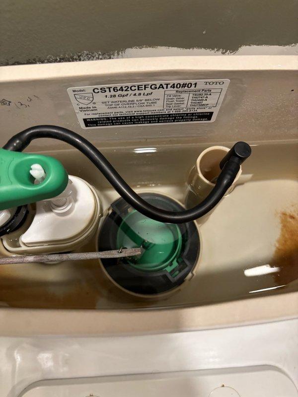 Responded to a malfunctioning TOTO Nexus one-piece toilet where the flush valve tower was sticking during operation, requiring manual intervention to refill the tank after each flush. Diagnosed the issue as a faulty flush valve mechanism where the green cylindrical component was not engaging automatically. Replaced the complete flush valve tower assembly with OEM TOTO replacement parts (THU747-A and THU407) to restore proper functionality. Following installation, refilled the tank and conducted 5-10 test flushes to verify proper operation and ensure the mechanism engaged correctly without sticking. All components functioned as designed with no issues detected during testing, and the toilet was returned to full service with reliable automatic flush and refill operation.