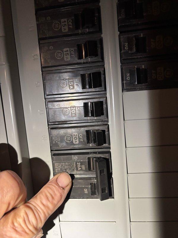 Returned to complete HVAC installation by replacing the existing 30-amp circuit breaker with the correct 20-amp breaker for the Lennox EL18 air conditioning unit. Also installed a long panel screw for the front panel of the unit that was missing from the factory.