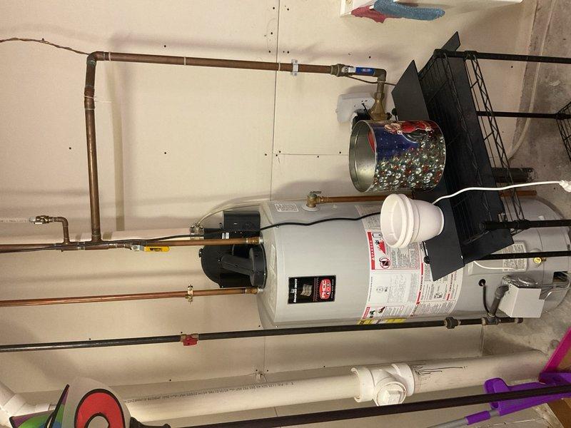 Responded to no cooling complaint on 20+ year old Bryant HVAC system. Found condenser unit humming but not operating, diagnosed failed capacitor reading zero microfarads. Customer declined repair as system replacement quotes had previously been provided and they did not wish to invest in temporary repairs on aging equipment.