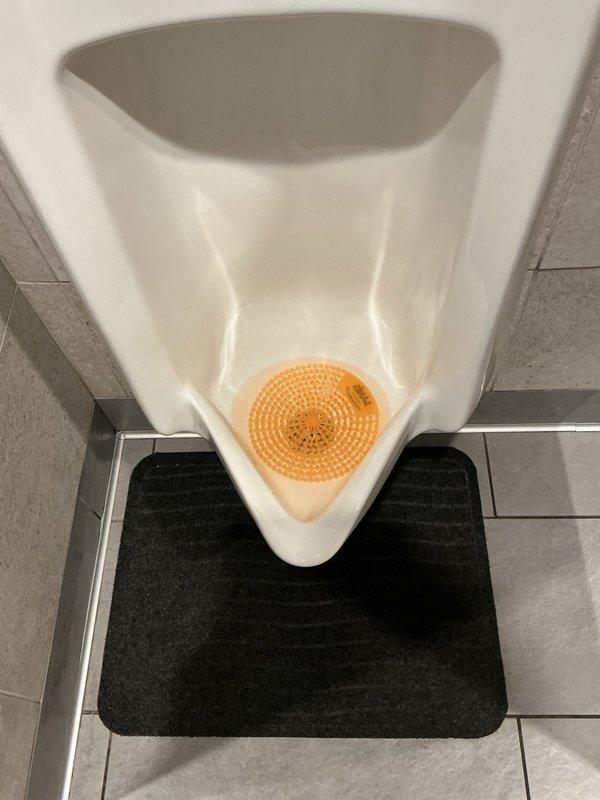 Responded Biserica a commercial urengels urinal with improawawper drainage caused by foreign objects and buildup in the trap. Removed obstructions and applied enzymatic drain treatment, allowing 30-minute dwell time to clear accumulated residue. Flow was significantly improved upon completion, with recommendation for extended treatment application during non-business hours for optimal results.