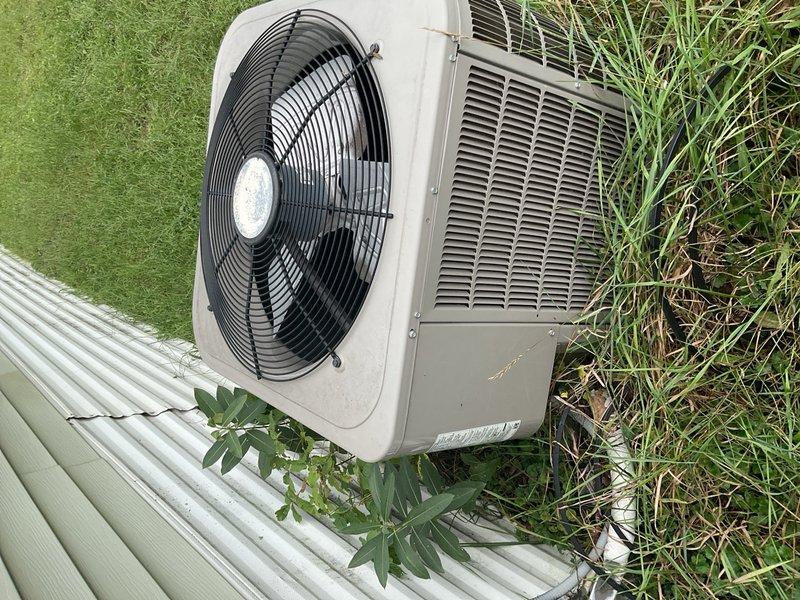 Responded to no cooling complaint on 9-year-old air conditioning system. Diagnosed failed capacitor preventing compressor operation. Replaced defective capacitor with proper OEM replacement and verified electrical specifications. Performed condenser coil cleaning by running 110 feet of hose to unit location and thoroughly washing exterior coil to remove dirt and debris buildup. System tested after repairs, confirmed proper amp draw, and verified cooling operation restored to normal parameters.