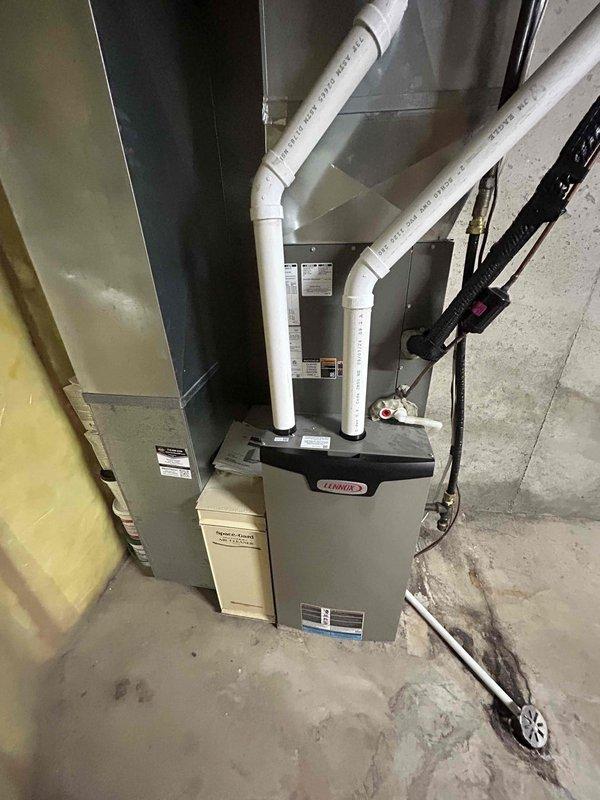 Completed annual AC tune-up on residential split system with Lennox furnace and outdoor condenser unit. Performed comprehensive inspection and maintenance procedures on both indoor and outdoor components, verified proper operation of all system components, checked refrigerant levels, cleaned condenser coils, and inspected electrical connections. System operating within normal parameters with no issues identified at time of service.