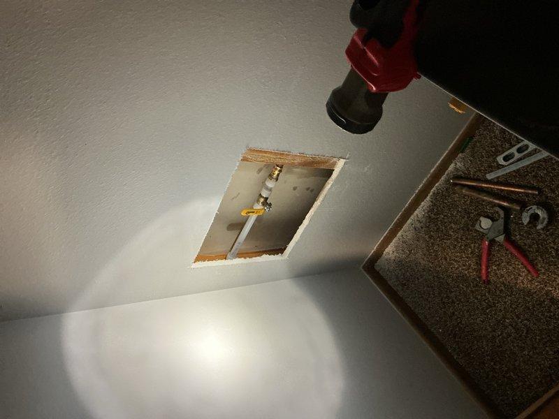Responded to a service call for a malfunctioning exterior hose bibb that had turned on randomly and could not be shut off, requiring the main water supply to be turned off. Upon inspection, confirmed the hose bibb was leaking and inoperable. Accessed the fixture through an interior wall panel, removed the defective hose bibb, and installed a new replacement unit. Discussed financing options for the repair work due to budget considerations. Tested the new hose bibb for proper operation and verified no leaks were present. Restored water service to the property and documented the completed installation with photographs.