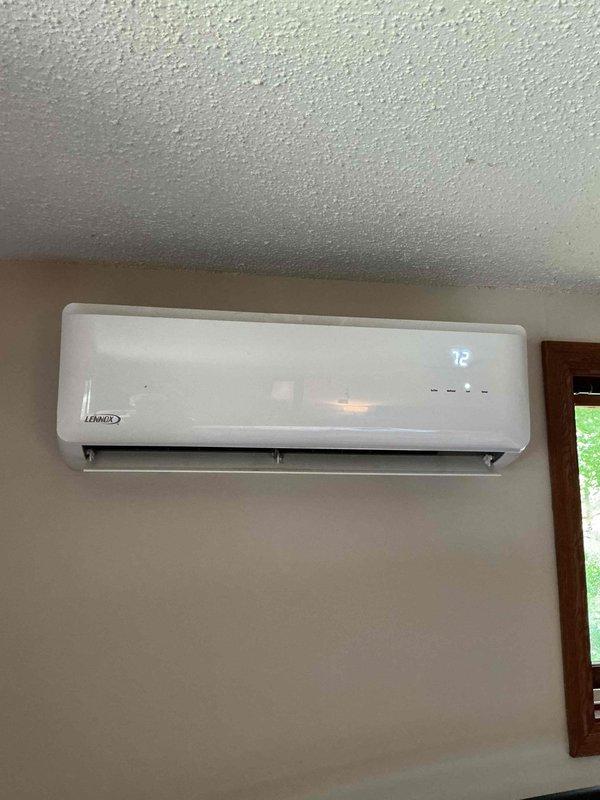 Performed comprehensive maintenance on 5-year-old Lennox ductless mini-split system. Reinstalled cleaned filters, verified proper condensate drainage, disassembled outdoor unit to inspect for rodent intrusion and debris, and thoroughly cleaned plugged condenser coil. System startup confirmed proper operation with 20-degree temperature differential across indoor unit.