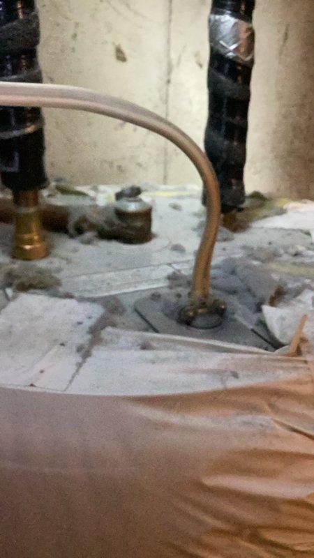 Completed recurring plumbing inspection for residential property with all plumbing systems found to be in good working order. Noted electrical safety concern with exposed wiring and wire nuts protruding from junction box in unfinished area, requiring attention from licensed electrician. Documented conditions with photographs including basement plumbing infrastructure with copper piping and electrical rough-in work.