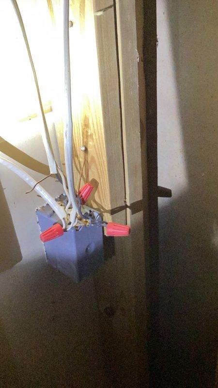 Completed recurring plumbing inspection for residential property with all plumbing systems found to be in good working order. Noted electrical safety concern with exposed wiring and wire nuts protruding from junction box in unfinished area, requiring attention from licensed electrician. Documented conditions with photographs including basement plumbing infrastructure with copper piping and electrical rough-in work.