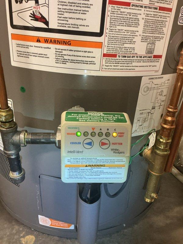 Responded to no hot water complaint on Rheem WH8-12 tanked water heater equipped with intelli-Vent technology. Upon arrival, diagnosed flammable vapor sensor code triggering safety lockout on gas valve. Reset gas valve and verified proper operation of intelli-Vent control system, restoring hot water service to the residence.