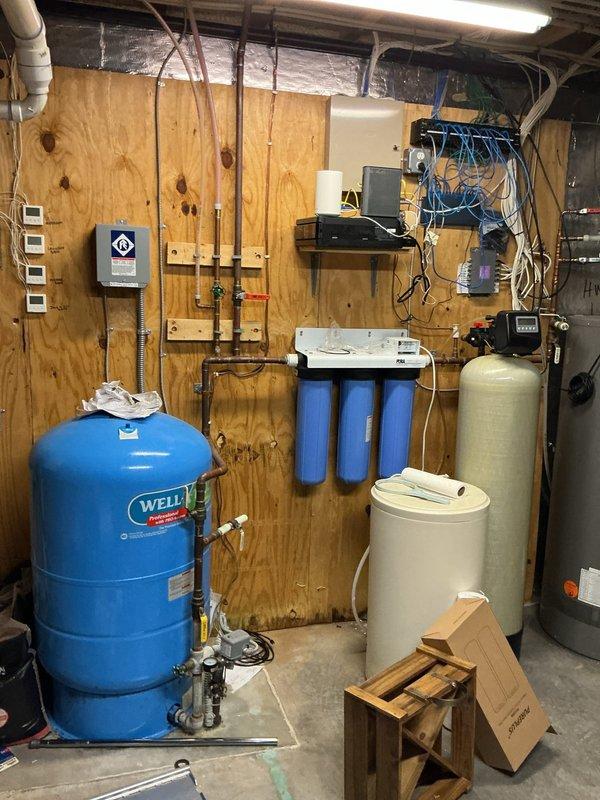 Responded to no hot water complaint on Rheem WH8-12 tanked water heater equipped with intelli-Vent technology. Upon arrival, diagnosed flammable vapor sensor code triggering safety lockout on gas valve. Reset gas valve and verified proper operation of intelli-Vent control system, restoring hot water service to the residence.