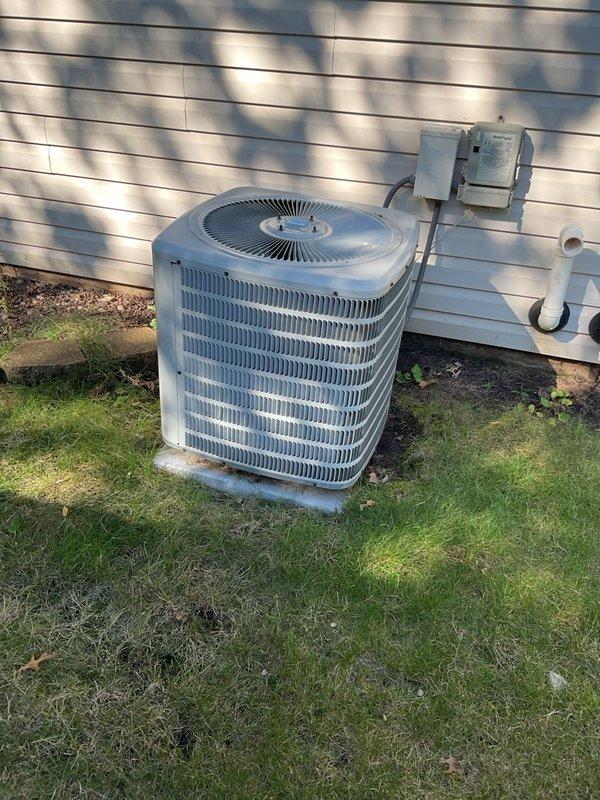 Performed comprehensive maintenance on 2014 Goodman air conditioner and two-stage gas furnace system. Verified refrigerant charge, electrical components, gas pressure, and overall efficiency within manufacturer specifications. Corrected line-set vibration at house penetration point. Inspected heat exchanger with no cracks, holes, or splits detected. Confirmed blower wheel and cage clean and in good condition. Flushed evaporator drain pan and condensate line. Both heating and cooling systems operating properly with no additional issues identified.