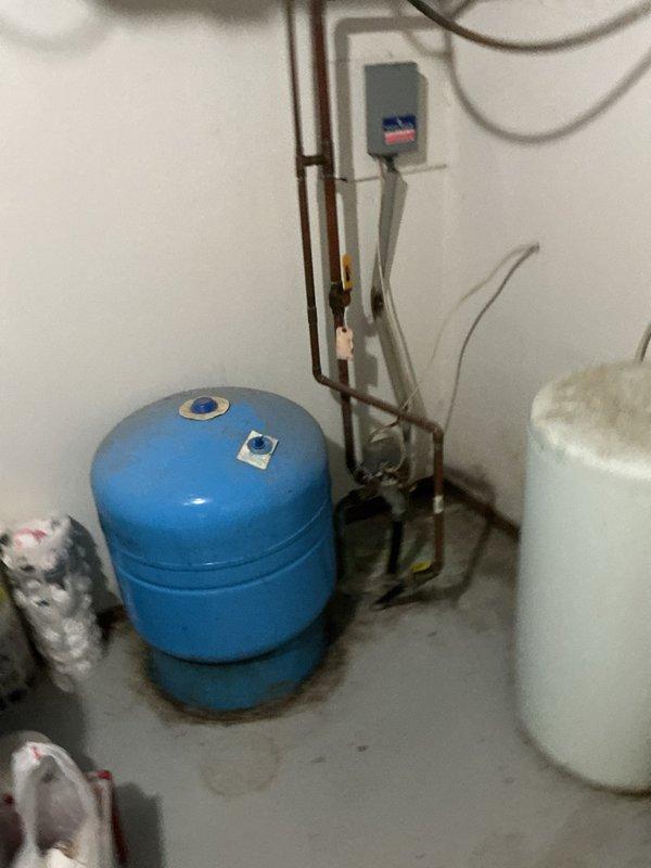 Performed comprehensive inspection and maintenance on tanked water heater system over 10 years old. Completed full flush of water heater to remove sediment buildup and restore optimal heating efficiency. Conducted water quality testing and thorough inspection of water softener system to ensure proper operation of all components. Verified all plumbing connections, pressure tank, and associated equipment were functioning correctly.