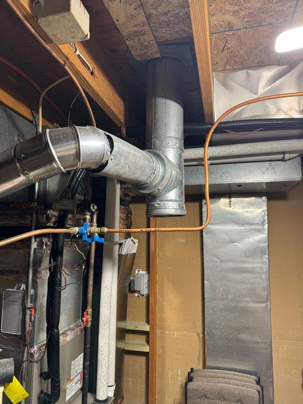 Responded to a water heater emergency involving a failed 50-gallon natural gas unit that had leaked and caused several inches of water accumulation in the basement. Removed and disposed of the existing failed water heater, installed a new 50-gallon natural gas standard water heater with proper venting and gas connections, and tested all systems to ensure proper operation and no leaks.