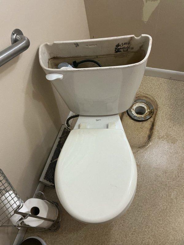 Responded to main floor toilet leaking into basement upon flushing. Removed and reset toilet after confirming failed wax seal. Discovered toilet drain line extremely backed up due to reported frequent flushing of wipes. Attempted to clear blockage but obstruction proved too severe for standard augering equipment. Installed new wax ring and reinstalled toilet to stop active leak. Coordinated same-day follow-up visit with drain specialist equipped with appropriate tools to clear stubborn blockage in main drain line.