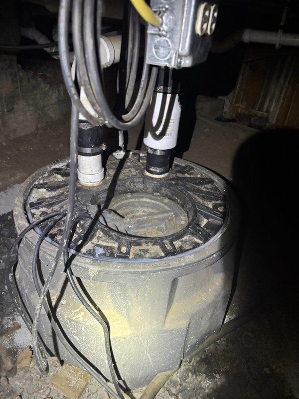 Responded to recurring sewer pump alarm with pump running continuously and water drainage issues. Upon inspection, identified misaligned discharge pipe from pump causing improper operation and triggering alarm condition. Adjusted and repositioned pipe to correct alignment, resolving continuous pump operation and clearing alarm system.