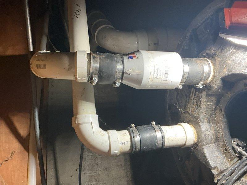 Responded to recurring sewer pump alarm with pump running continuously and water drainage issues. Upon inspection, identified misaligned discharge pipe from pump causing improper operation and triggering alarm condition. Adjusted and repositioned pipe to correct alignment, resolving continuous pump operation and clearing alarm system.