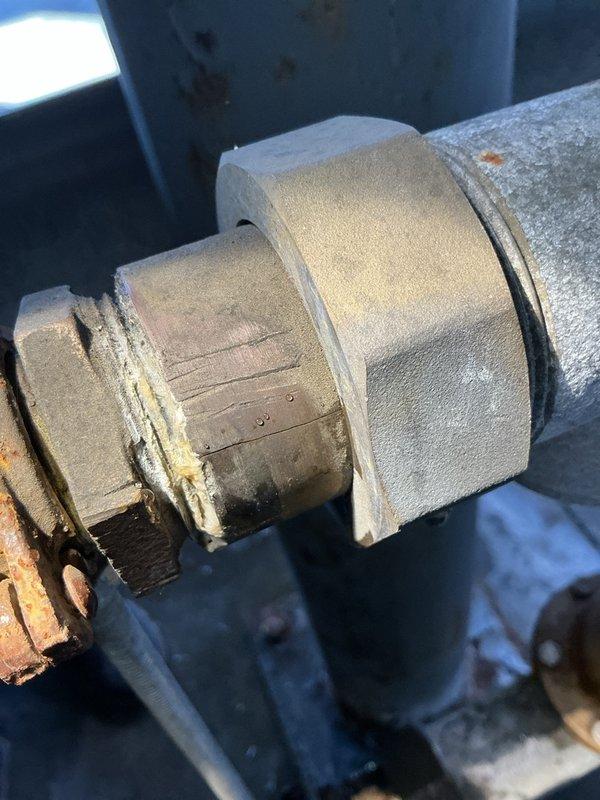 Responded to emergency water leak in building where pipe joint was actively spraying water. Upon arrival, building water supply had already been shut off to stop the leak. Inspection revealed a cracked union on the pressure reducing valve (PRV) assembly, which was the source of the water discharge. The PRV showed significant age and wear, with visible corrosion and deterioration on the brass fittings and surrounding insulation. Documented the damaged PRV assembly and cracked union with photographs showing the weathered condition of the valve body, fittings, and compromised pipe insulation. Prepared estimate for complete PRV replacement to restore proper water pressure regulation and eliminate the leak hazard.