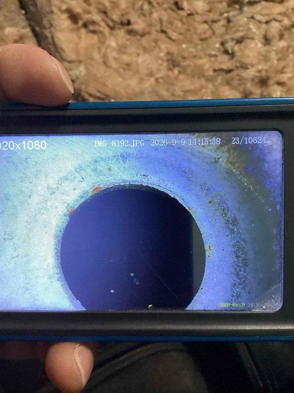 Performed municipal rental license inspection on 30-year-old furnace system. Upon thorough examination using borescope camera equipment, discovered cracked heat exchanger posing immediate safety hazard. Shut off gas supply to unit, red-tagged furnace as unsafe for operation, and documented findings with photographic evidence of heat exchanger damage.