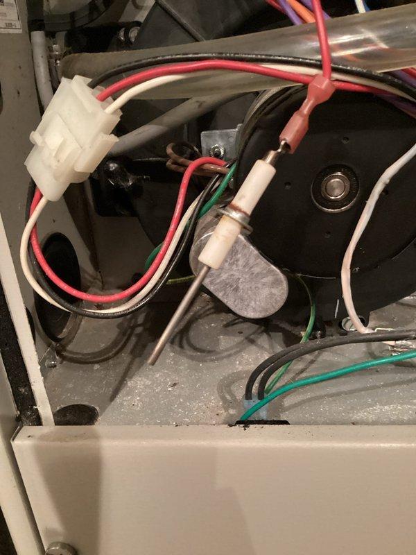 Completed comprehensive AC tune-up on 15-year-old system with promotional coupon applied. Performed full system inspection including amp draw verification on all components, confirmed proper operation of motor assembly and flame sensor, and documented heat exchanger wear and tear with photographs for customer records. All system components functioning within normal parameters at time of service, filter found clean, and enrolled customer in family rewards maintenance program for ongoing system care.