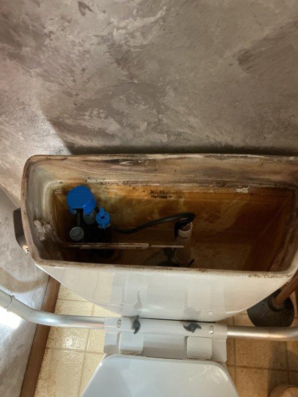 Replaced non-adjustable fill valves with adjustable units on two toilets to address slow tank filling issues. Throttled down water flow to the bowl to prioritize faster tank refilling, resulting in a 90-second fill time for the upstairs toilet and improved performance on the smaller downstairs unit. Advised that if adjustable valves do not resolve the filling concerns, complete toilet replacement would be the remaining solution.
