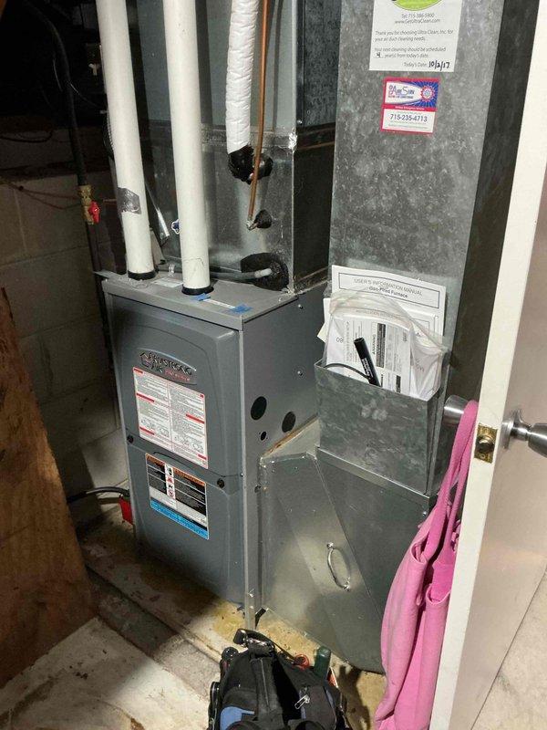 Completed annual furnace tune-up on 9-year-old residential heating unit. Performed comprehensive maintenance including cleaning flame sensor, verifying proper condensate drainage, and inspecting blower wheel. Replaced heavily soiled air filter and tested all electrical components, confirming all readings within manufacturer specifications. Conducted operational testing with gas pressure verification at proper levels and confirmed unit achieving optimal 70° temperature rise with no issues found.