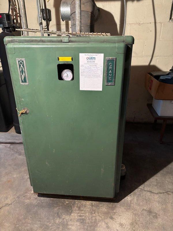 Responded to no heat call for oil-fired boiler system. Upon arrival, found aged Giant brand boiler repeatedly tripping safety reset button during ignition attempts. Conducted visual inspection and operational testing, confirming ignition failure with no spark present at burner assembly. Observed unit attempting to fire but immediately going to lockout mode, indicating potential issues with igniter assembly, cad cell flame sensor, or primary control module. Given the age and condition of the equipment, along with repeated safety trips, recommended against extensive diagnostic troubleshooting due to likelihood of multiple component failures and diminishing parts availability for older oil-burning equipment. Discussed system condition and replacement options with homeowner, who expressed interest in exploring both repair and new boiler installation alternatives. Documented equipment model information and captured photographic evidence of existing system for replacement proposal preparatio