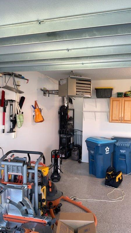 Installed LF25 gas unit heater in residential garage with wall mounting. Ran flexible gas line up to 10 feet from supply point to heater location, incorporating two gas fittings for proper connection. Performed complete leak check on all gas connections and fittings to ensure safe operation and code compliance.