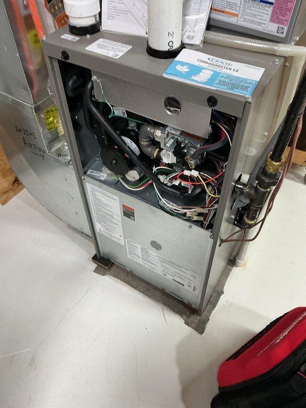 Completed comprehensive furnace maintenance on a 3-year-old Lennox heating system that had not been serviced since installation. Performed standard tune-up procedures including inspection of all internal components, burner assembly, blower motor, electrical connections, and safety controls. Conducted electrical diagnostics using digital multimeter to verify proper system operation and voltage readings. Noted significant dust and debris accumulation in ductwork throughout the system. System is currently operating properly with all components functioning as designed. Provided estimate for professional duct cleaning services to address accumulated debris and improve system efficiency and indoor air quality.