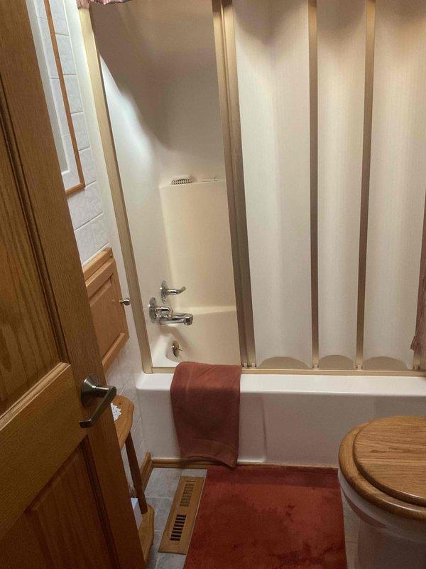 Completed comprehensive plumbing inspection of residential bathroom as part of recurring maintenance service. Inspected bathroom vanity faucet with chrome finish and tub/shower faucet assembly, verifying proper operation, checking for leaks, and assessing overall condition of fixtures. All plumbing components found to be functioning properly with no immediate repairs required.