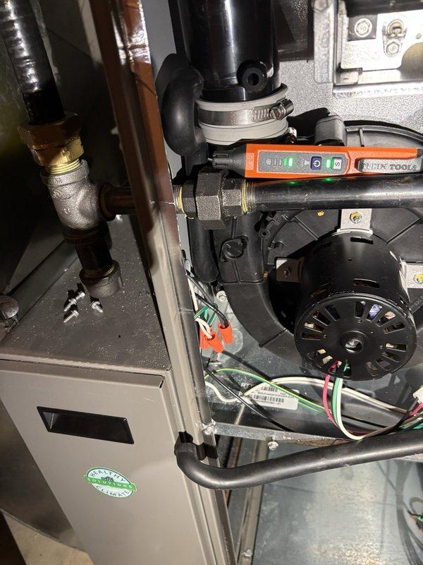 Completed scheduled maintenance on 2023 Lennox SLP furnace under maintenance plan agreement. Performed comprehensive inspection of internal components, burner assembly, and heat exchanger with no spiderwebs or debris found. Removed insects restricting evaporator drain pan, flushed drain line with 100 oz of water to ensure proper condensate removal, and verified unobstructed flow. Tested system operation through S30 thermostat and confirmed all functions operating within normal parameters. Noted construction-related dust accumulation in supply ductwork and recommended professional duct cleaning to improve air quality and system efficiency.