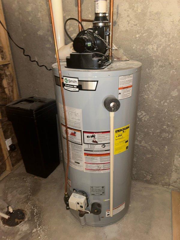 Completed comprehensive furnace tune-up inspection on residential heating system. Performed full diagnostic evaluation including thermostat operation, air filter condition, blower assembly, burner and heat exchanger compartment, inducer operation, ignition system, flame sensor, safety controls, electrical components, condensate drain, and temperature rise measurements. Utilized dual port manometer to verify gas pressure readings, which measured within manufacturer specifications at 350 and 358 on digital display. All system components found operating within normal parameters with no mechanical deficiencies or safety concerns identified. Documented equipment make, model, and serial number information with photographs. System verified to be functioning properly and safely at time of inspection.