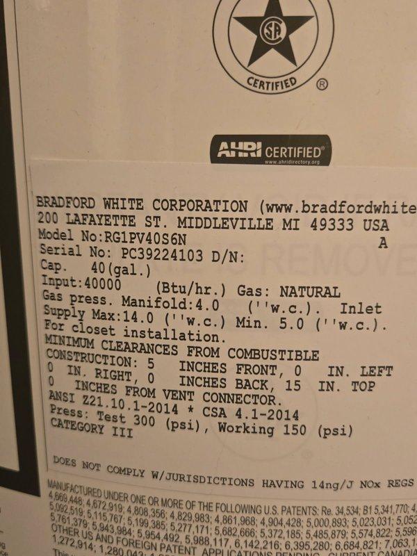 Responded to water heater leak from vertical copper discharge pipe. Upon inspection, identified temperature and pressure relief valve as source of drip. Verified system water pressure was within normal operating range to rule out excessive pressure as contributing factor. Replaced defective T&P relief valve with new unit and tested for proper operation and seal integrity. Unit is a Bradford White 40-gallon natural gas water heater, model RG1PV40S6N. System restored to normal operation with no active leaks detected upon completion.