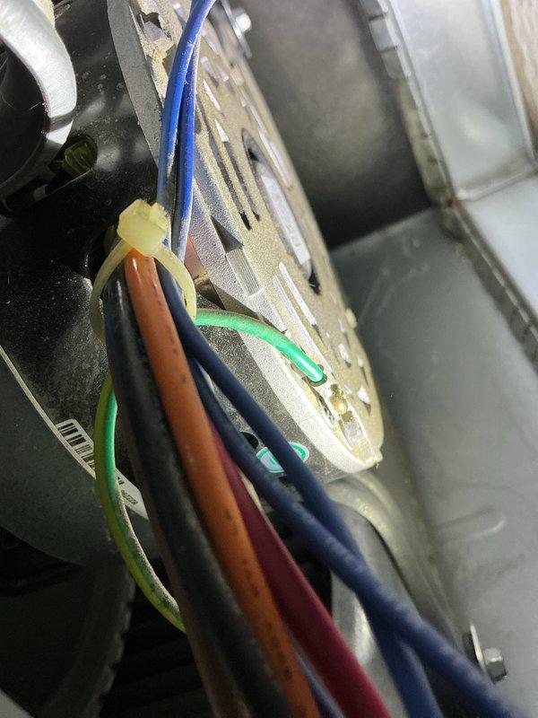 Completed scheduled maintenance on 10-year-old gas furnace system with humidifier under maintenance agreement. Performed standard inspection, filter service, and system diagnostics. During inspection, discovered evaporator coil assembly with significant frost and ice accumulation on fins and surfaces, indicating potential airflow restriction or refrigerant issue. Measured system amperage at 0.53A using digital multimeter to verify compressor performance. Documented coil condition with photos showing ice buildup on metallic fins and electrical connections. System currently operational but frost condition requires attention to prevent efficiency loss and potential component damage. Recommended follow-up service to address ice formation issue, which may involve checking airflow, refrigerant charge, or defrost controls.