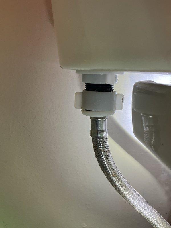 Responded to a water leak investigation that required collaboration with restoration contractor to locate source behind wall. Upon return visit, replaced faulty toilet water supply line with new braided stainless steel flex line and coupling assembly, resolving the leak issue.