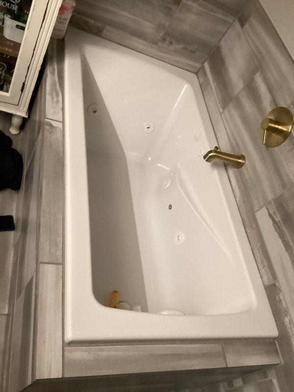 Responded to reported leaky toilet and abnormally high water bill at rental property. Conducted comprehensive inspection of all plumbing fixtures including toilets, faucets, and water supply lines throughout the property. Checked toilet tank components including flapper valve, fill valve, and overflow tube for signs of continuous running or leaking. Verified water meter was stationary with no active flow, confirming no hidden leaks in the system. Determined that large capacity bathtub and tenant water usage patterns were likely responsible for elevated consumption rather than plumbing defects.
