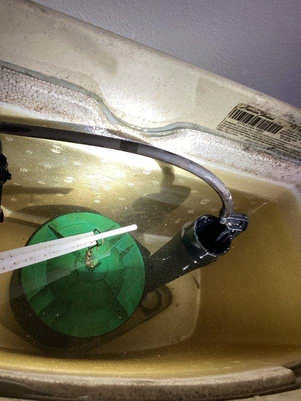 Responded to reported leaky toilet and abnormally high water bill at rental property. Conducted comprehensive inspection of all plumbing fixtures including toilets, faucets, and water supply lines throughout the property. Checked toilet tank components including flapper valve, fill valve, and overflow tube for signs of continuous running or leaking. Verified water meter was stationary with no active flow, confirming no hidden leaks in the system. Determined that large capacity bathtub and tenant water usage patterns were likely responsible for elevated consumption rather than plumbing defects.