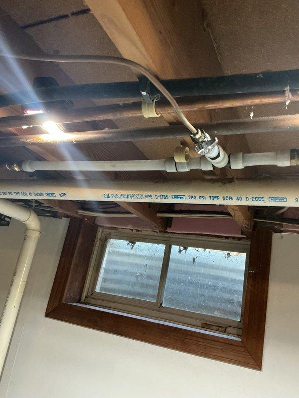 Returned to address water leak at previously installed press fitting. Upon inspection, discovered the copper pipe was extremely thin and soft, preventing proper seal with press connection. Removed failed press fitting and soldered a new adapter directly onto the copper pipe to ensure watertight connection. Completed repair and verified system integrity.