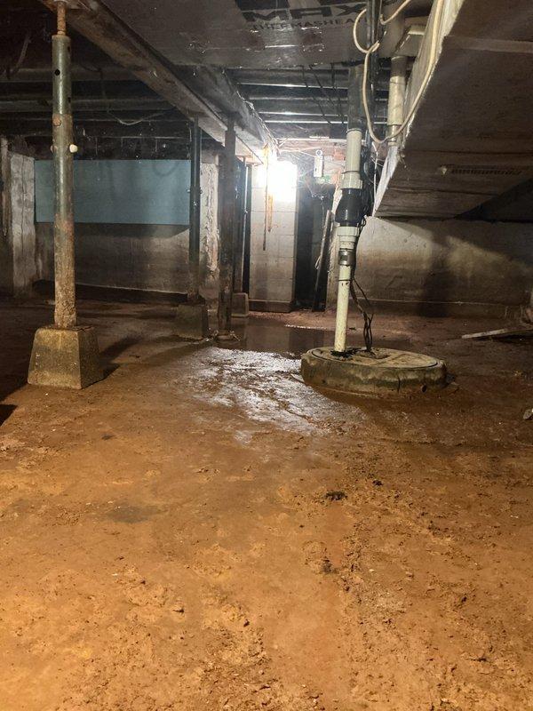 Responded to service call for dual sump pump system running continuously without shutting off in crawlspace installation. The existing five-year-old dual pump system had been experiencing recurring annual operational failures. Upon inspection, confirmed both pumps were operating non-stop, indicating float switch malfunction or control system failure. Removed the failed dual pump system and installed new dual pump battery backup sump pump system to provide reliable water removal and emergency backup protection. Tested system operation to verify proper cycling and automatic shutoff functionality. Routed discharge line to exterior of property and confirmed proper drainage away from foundation.