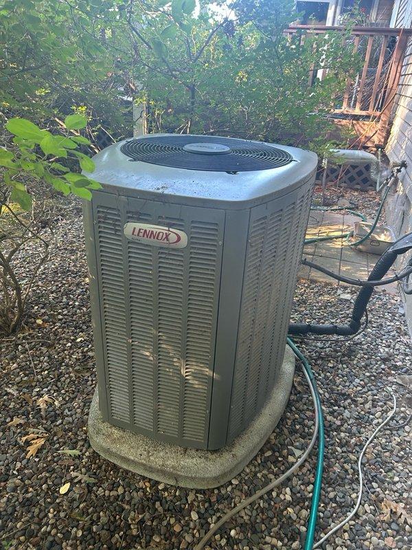 Completed comprehensive AC tune-up on 4-year-old Lennox system. Discovered and removed extremely dirty impact debris from outdoor condenser coils, replaced air filter, performed thorough coil cleaning, verified refrigerant charge levels, and confirmed all system components operating within normal parameters. Recommended ongoing maintenance schedule for regular coil and filter cleaning to maintain optimal system efficiency.