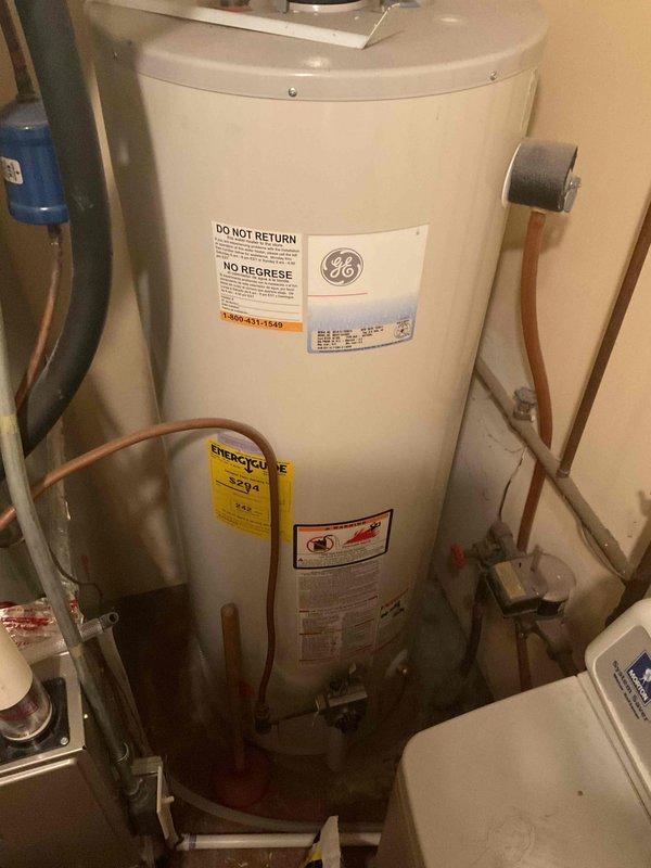 Completed comprehensive plumbing inspection of owner-occupied residential property as part of recurring maintenance service. Inspected and photographed all accessible plumbing systems including GE water heater, water softener system with adequate salt supply, copper supply lines, shut-off valves, and associated connections in utility area. All systems found to be operating properly with no leaks, deficiencies, or immediate concerns identified at time of inspection.