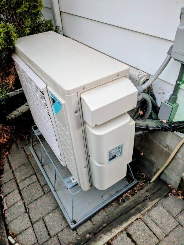 Responded to no cooling complaint on Daikin 4-ton mini split system displaying E7 error code indicating DC fan motor fault. Upon arrival, verified outdoor unit fan spun freely and investigated further. Accessed control panel and found error code 3-4 with red indicator light, which diagnostics confirmed as refrigerant shortage. Connected manifold gauges to system and recorded suction pressure at 26 PSI with saturation temperature of -16°F, indicating complete loss of R410A refrigerant charge. Informed customer that system requires leak detection service, refrigerant recharge, and UV dye injection to identify leak source. Provided estimate for diagnostic leak search and repair process. System left in non-operational state pending approval and follow-up appointment to locate and repair refrigerant leak before recharging system.