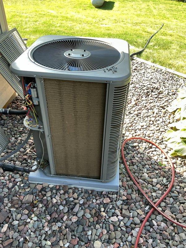 Responded to no cooling and no heating complaint on system installed two years ago. Diagnosed failed contactor on outdoor condensing unit which was causing electrical issues that tripped the furnace fuse. Replaced defective contactor, restored power to system, and verified proper operation of both cooling and heating functions.