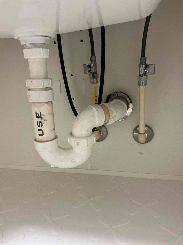 Replaced aged laundry tub with new durable unit and installed new shut-off valves for improved water control and longevity. Professionally installed customer-provided faucet, ensuring secure fitting and leak-free operation. Replaced existing PVC drain assembly with new P-trap configuration and installed flexible supply lines with proper connections to resolve leakage issues and enhance functionality of the laundry area.